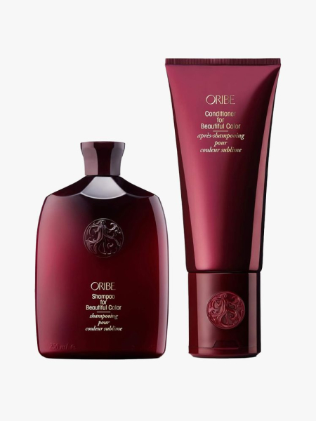 Oribe Shampoo and Conditioner for Beautiful Color in branded components on a light gray background
